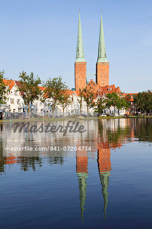 Cathedral reflected in the River Trave, Stadttrave, Lubeck, Schleswig Holstein, Germany, Europe