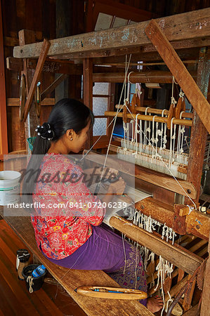 Burmese woman weaving, Nampan village, Inle Lake, Shan State, Myanmar (Burma), Asia