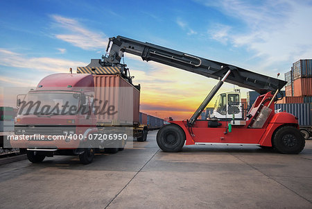 Stack of Freight Containers at the Docks with Truck