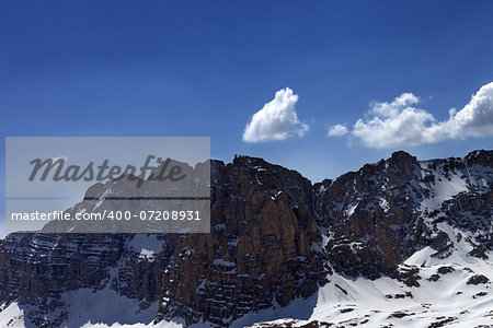 Snowy rocks in nice day. Turkey, Central Taurus Mountains, Aladaglar (Anti-Taurus), view from plateau Edigel (Yedi Goller)