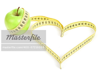 green apple with a measuring tape and heart symbol isolated on white background