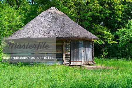 Typical traditional village antique wooden storehouse or barn