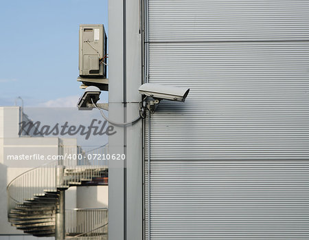 A CCTV camera at the corner of the building