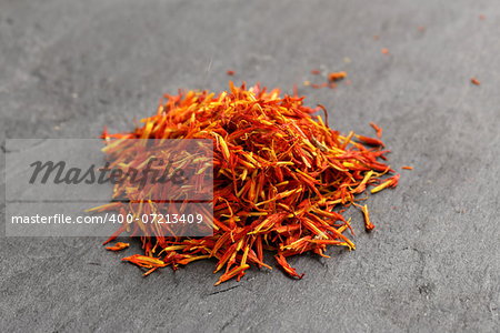 moroccan saffron treads in pile, macro shot soft focus