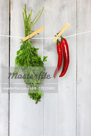 Photo of green  parsley and cayenne pepper