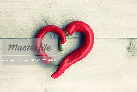 Photo of red heart shape chili pepper