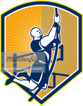 Illustration of a crossfit athlete body weight exercise rope climb hanging facing side set inside shield crest done in retro style on isolated white background