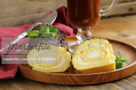 vanilla roll cake with chocolate ganache and  creamy cream