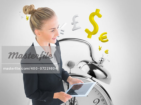 Composite image of blonde businesswoman holding new tablet