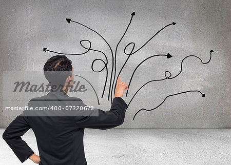 Composite image of asian businessman pointing