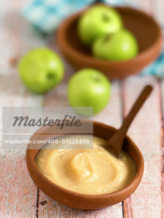 close up of a bowl of apple sauce