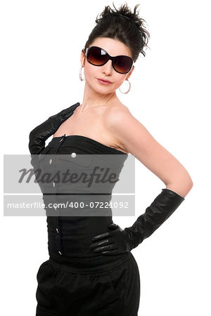 Portrait of beautiful young woman in a black dress. Isolated