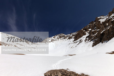 Snowy mountains and blue sky at nice winter day. Turkey, Central Taurus Mountains, Aladaglar (Anti Taurus). Wide angle view.