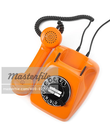 orange rotary phone on white background