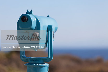 picture of seaside binoculars with nobody using them