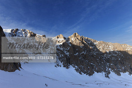 Hikers on snowy mountains in morning. Turkey, Central Taurus Mountains, Aladaglar (Anti Taurus).