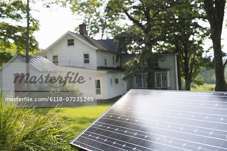 A solar panel in a farmhouse garden. A solar panel in a farmhouse garden.