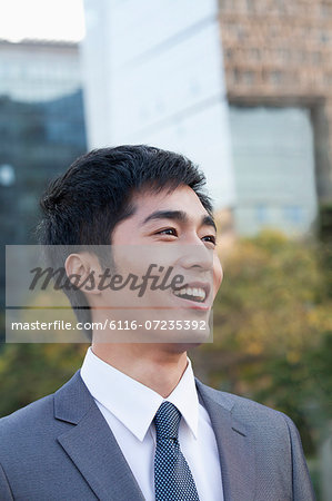 Young Businessman  Looking away