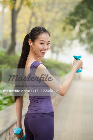 Young woman exercise in the park