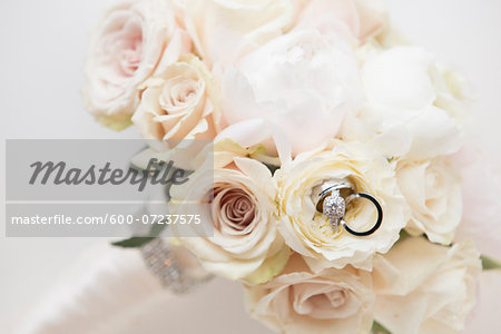 Close-up of Rings in Bouquet of Roses, Studio Shot