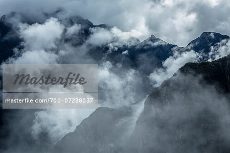 Overview of the Andes Mountains with clouds, at Machu Picchu in the Sacred Valley of the Incas, Peru