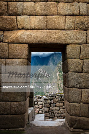 Close-up of stone walls and brick structures for doorways, Machu Picchu, Peru