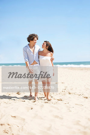 Couple walking on beach