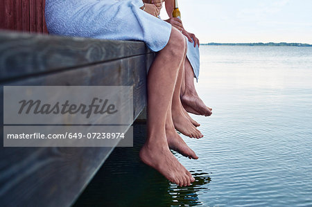 Close up of three males waist down outside sauna