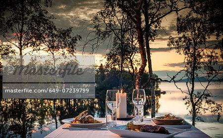 Table set for dinner outdoors, Arjeplog, Lapland, Sweden