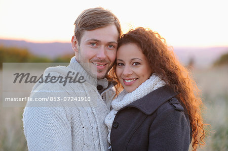 Smiling couple in autumn, portrait