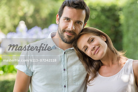 Couple hugging outdoors