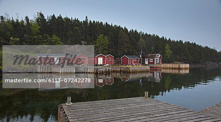 Buildings and docks along calm bay