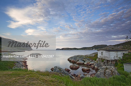 Rocks along calm bay