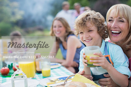 Family eating together outdoors