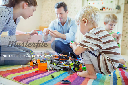 Father playing with children