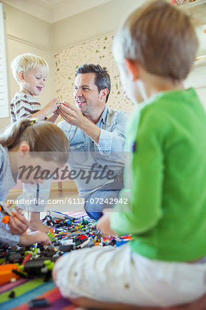 Father playing with children Father playing with children