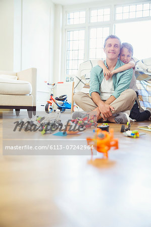 Father and son playing together