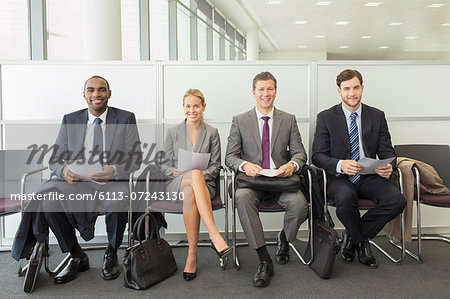 Business people sitting in waiting area