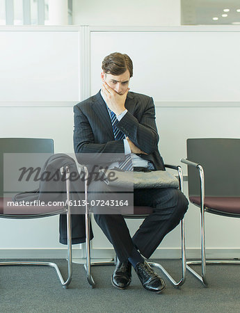 Businessman sitting in waiting area