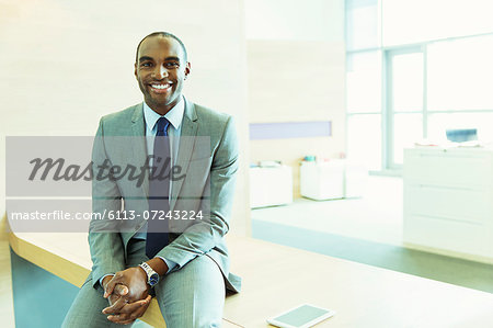 Businessman smiling in office