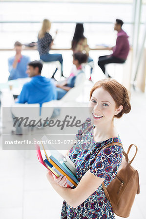 University student smiling in lounge University student smiling in lounge