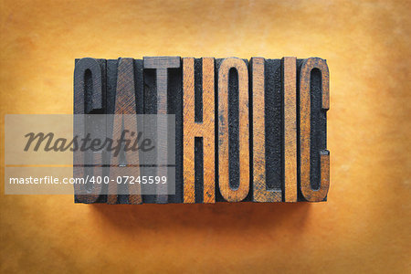 The word CATHOLIC written in vintage letterpress type