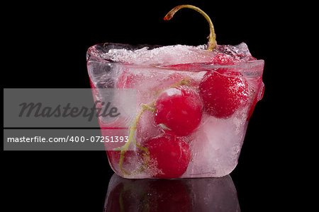 Berries frozen currant in the ice