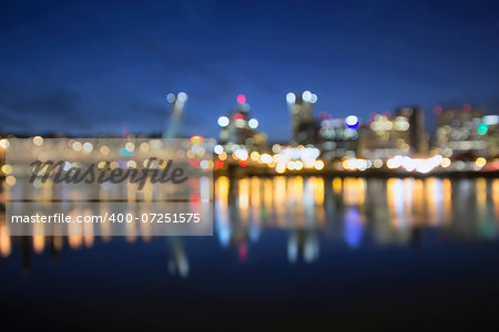 Out of Focus Portland Oregon Skyline with Hawthorne Bridge and Willamette River City Lights Reflection at Blue Hour