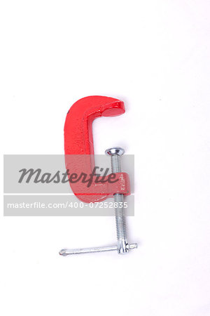 Red clamp isolated on a white background