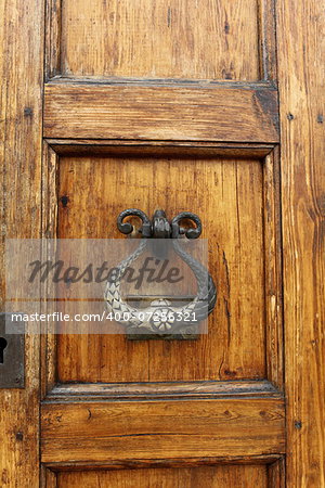 The door knocker  and handle on an medieval door