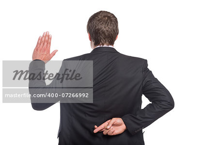 Rear view of a businessman with crossed fingers and stop gesture over white background