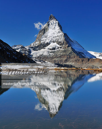 Matterhorn reflected in Lake Riffelsee, Zermatt, Alps, Valais, Switzerland