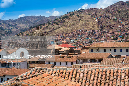 Overview of tile rooftops with mountains in the distance, Cusco, Peru Overview of tile rooftops with mountains in the distance, Cusco, Peru