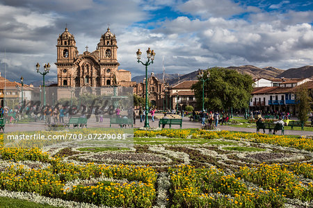 Overview of gardens at Plaza de Armas with Church of the Society of Jesus, Cusco, Peru